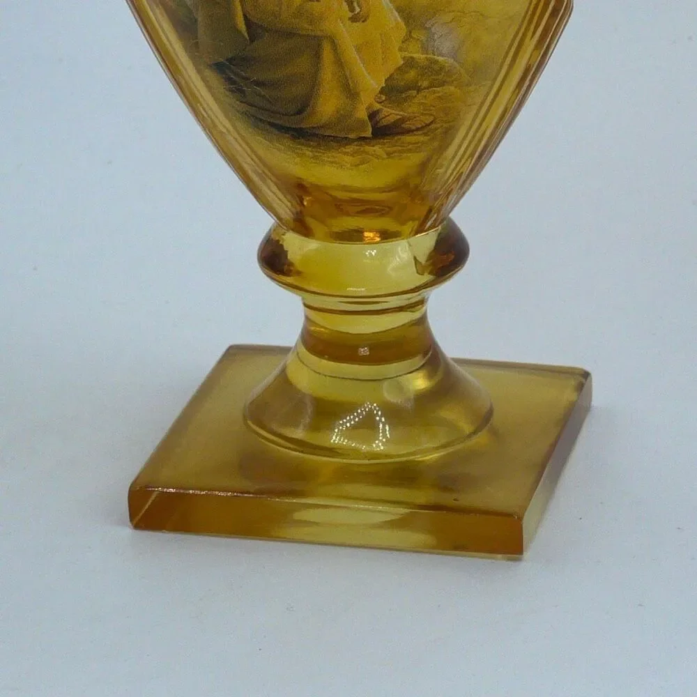 Vintage Amber Glass Religious pedestal goblet with music box lid.